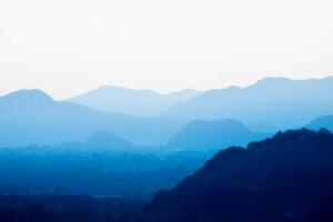 Blue layer of the mountain in the morning. photo