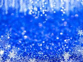 Blue sparkling glitter bokeh background. photo