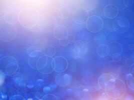 Blue sparkling glitter bokeh background. photo