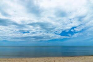 On the beach with blue sky photo