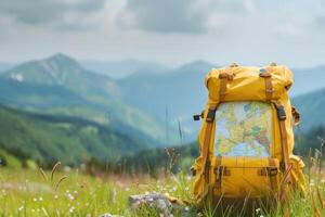 AI generated Tourist yellow backpack and map on background green grass nature in mountain, blurred panoramic landscape. photo