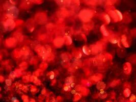 Red Sparkling Glitter bokeh Background. photo