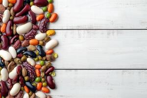 AI generated Mixed dry beans on white wooden board from above. Space for text. photo