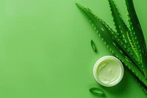 AI generated Cosmetic cream with aloe vera leaves on a green background with space for text. photo