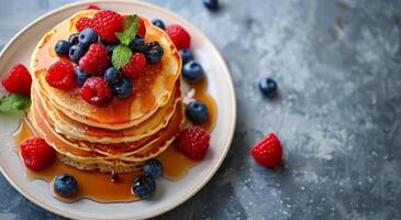 AI generated Delicious Stack of Pancakes With Berries and Syrup photo