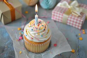 AI generated Cupcake with birthday candle and gift box. photo
