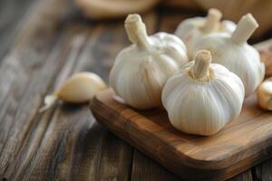 AI generated Garlic whole and sliced on a wooden table. Antibacterial, boosts immunity. photo