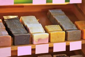 Eco shop shelf with hand made soap bars photo