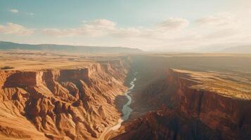 AI generated A drone shot of a beautiful canyon scene with the sunlight creating shadows and contrasts on the rocks photo