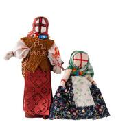 Lyalka motanka handmade. Ukrainian national doll amulet, silt patches and threads are made without a needle. Symbol of Ukraine. Motanka dolls on a white background. photo