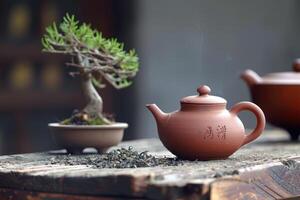 AI generated Traditional teapot made from red clay placed on an old wooden table. photo