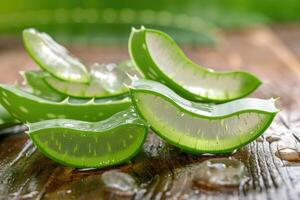 AI generated Photo aloe vera slices with aloe gel on wood table.