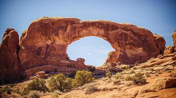 ai generado árido paisaje con un distintivo rocoso arco foto