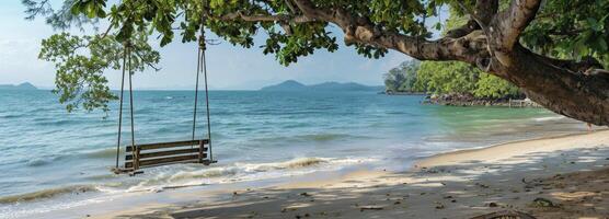 AI generated A wooden bench swing hanging from the branch of an old tree on a beach photo