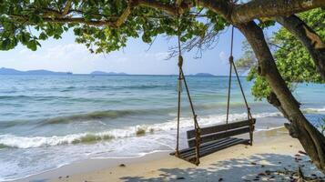 ai generado un de madera banco columpio colgando desde el rama de un antiguo árbol en un playa foto