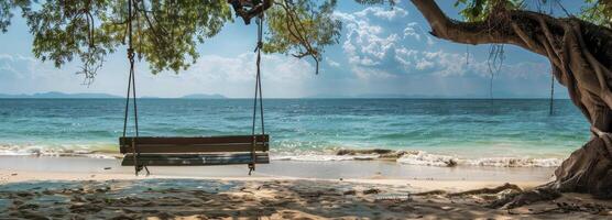 AI generated A wooden bench swing hanging from the branch of an old tree on a beach photo
