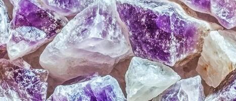 AI generated Macro photography of a stunning cluster of raw amethyst crystals with their distinctive purple hue and crystalline structure photo