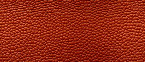 AI generated Textured Red Leather Close-Up Background. Close-up of red leather texture with a pattern of interwoven lines, suitable for backgrounds or detailing photo