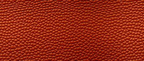 AI generated Textured Red Leather Close-Up Background. Close-up of red leather texture with a pattern of interwoven lines, suitable for backgrounds or detailing photo