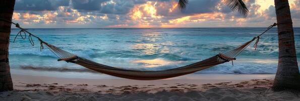 AI generated A hammock is securely tied between two tall palm trees on a sandy beach. The hammock sways gently in the breeze, inviting relaxation and a peaceful moment by the sea photo