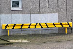 guardrail on a house in black and yellow photo