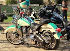 Kyiv, Ukraine - 20 May 2017 - Motorcycle show - Vintage Harley Davidson motorbike with a matching helmet photo