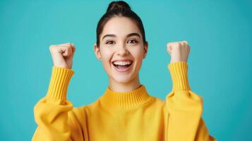 AI generated Feeling Ecstatic, A Happy Young Woman with Raised Fists on a Blue Background, Generative AI photo