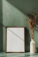 AI generated empty white canvas frame mockup with dried plants in vase on green wall photo