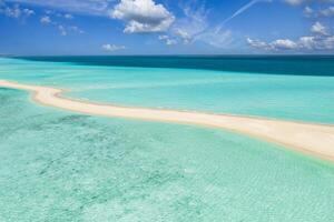 Relaxing aerial beach sand bank, summer vacation holiday template banner. Waves surf with amazing blue ocean lagoon, sea shore, coastline. Perfect aerial drone sky view. Peaceful bright beach, seaside photo