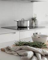 AI generated white minimal kitchen and bundles of green rosemary photo