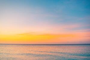 Dreamlike seascape skyline. Artistic meditation nature scene. Abstract inspirational sunset photography for background, sky and clouds with sea. photo