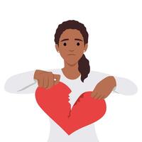Young woman hand tearing apart a paper heart. broken heart and sad. vector