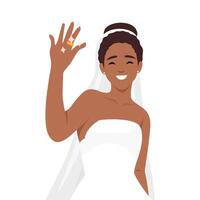 Young woman happy just married spouse or wife wearing a veil with flowers and showing her wedding ring on her finger vector