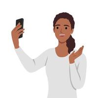 Happy woman talking video call on smartphone and waving with hand vector