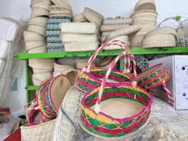 Handmade fruit baskets from rattan are environmentally friendly and help micro businesses photo