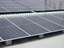 Clean energy from solar panels that has a lot of dust photo