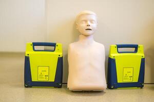 Manikin for demonstration of CPR Cardiopulmonary resuscitation for resurrected patients and Automated External Defibrillator photo