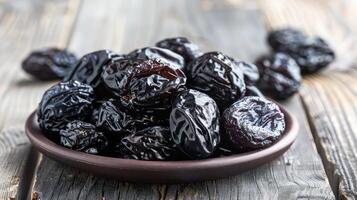 AI generated a pile of prunes on plate on a wooden table in the kitchen close-up photo