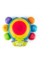 The game is a developing musical Beetle. colorful and fun multifunctional item. Musical beetle toy on white background isolation photo