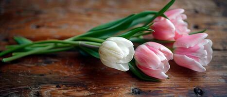 AI generated Bunch of beautiful pink tulips against wood vintage surface with empty space for text. photo