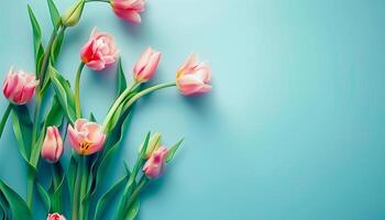 AI generated Bunch of pink tulips spring flowers over blue background with empty space for text. photo