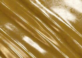 Wave golden textured material photo