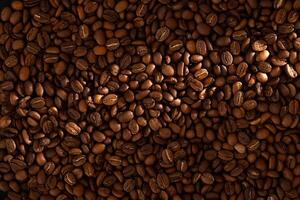 Fresh roasted coffee beans texture with lightbeam photo