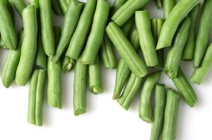 Fresh chopped green beans isolated on white background photo