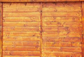 Light brown wooden background. Texture of wooden planks. photo