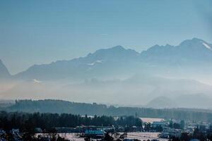 Winter in the Alps. Beautiful view of the mountain ranges in Salzburg in Austria. photo
