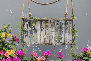 AI generated A handmade wooden sign hung by vine ropes and surrounded by colorful flowers photo