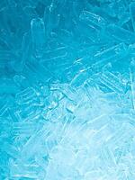 Ice cubes background, ice cube texture, ice wallpaper It makes me feel fresh and feel good. In the summer, ice and cold drinks will make us feel relaxed, Made for beverage or refreshment business. photo