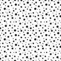 Organic black dots ranging in size on a white background seamless pattern vector