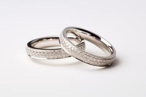 AI generated Elegant wedding rings with diamond on a reflective surface photo